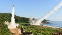 北 'ICBM 도발' 맞대응… 한미 첫 미사일 무력시위